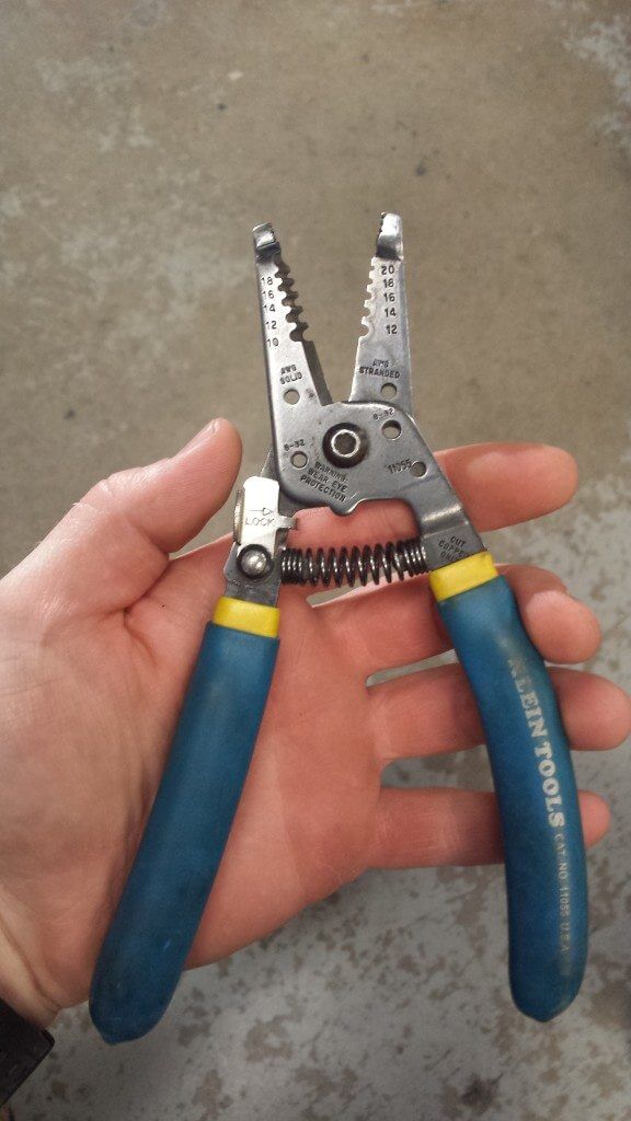 Strips 10-20 gauge wire, cuts screws, and loops wire. Great tool.